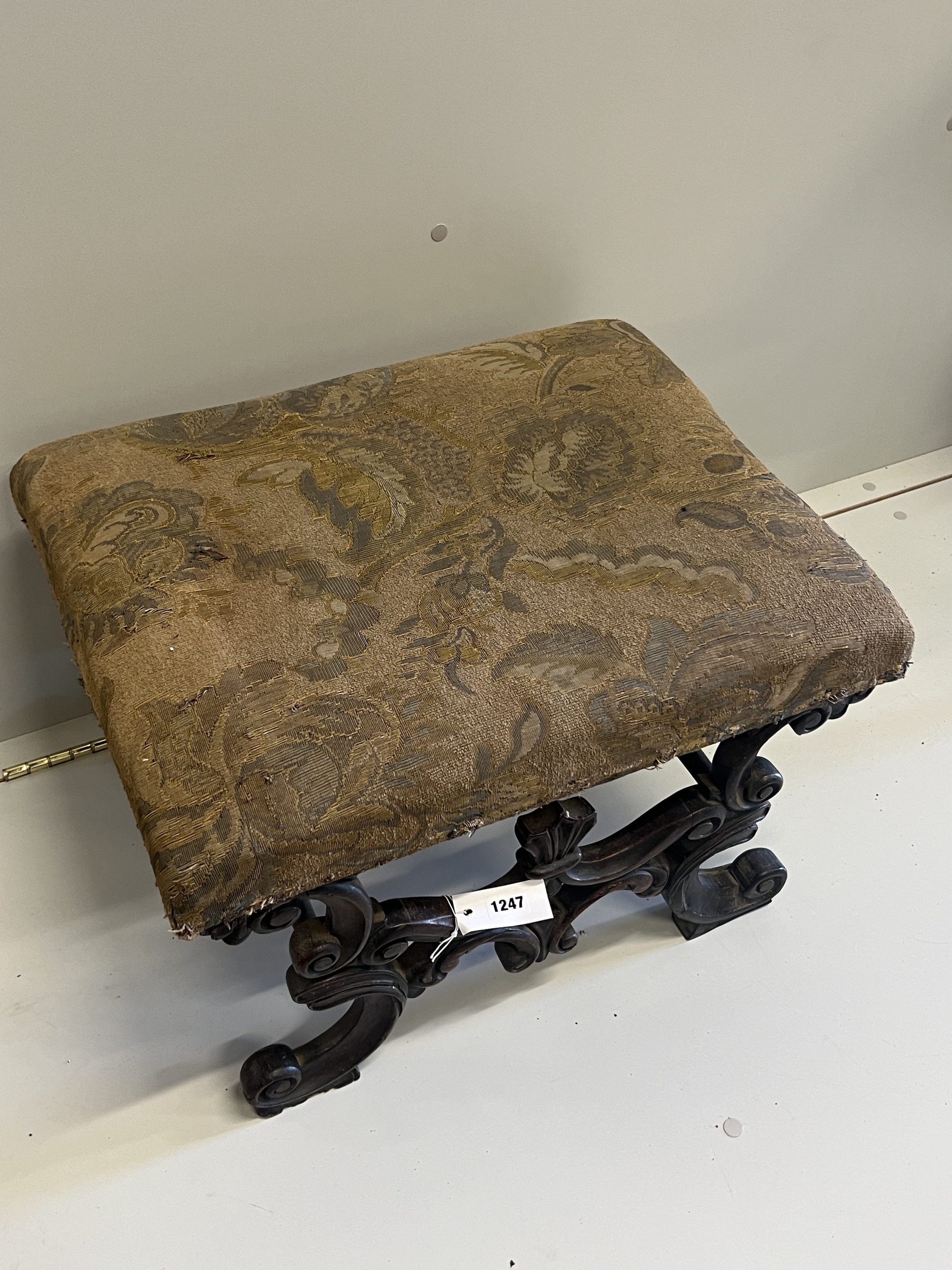 A Victorian carved and upholstered rectangular 'X' framed oak dressing stool, width 56cm, depth 45cm, height 36cm